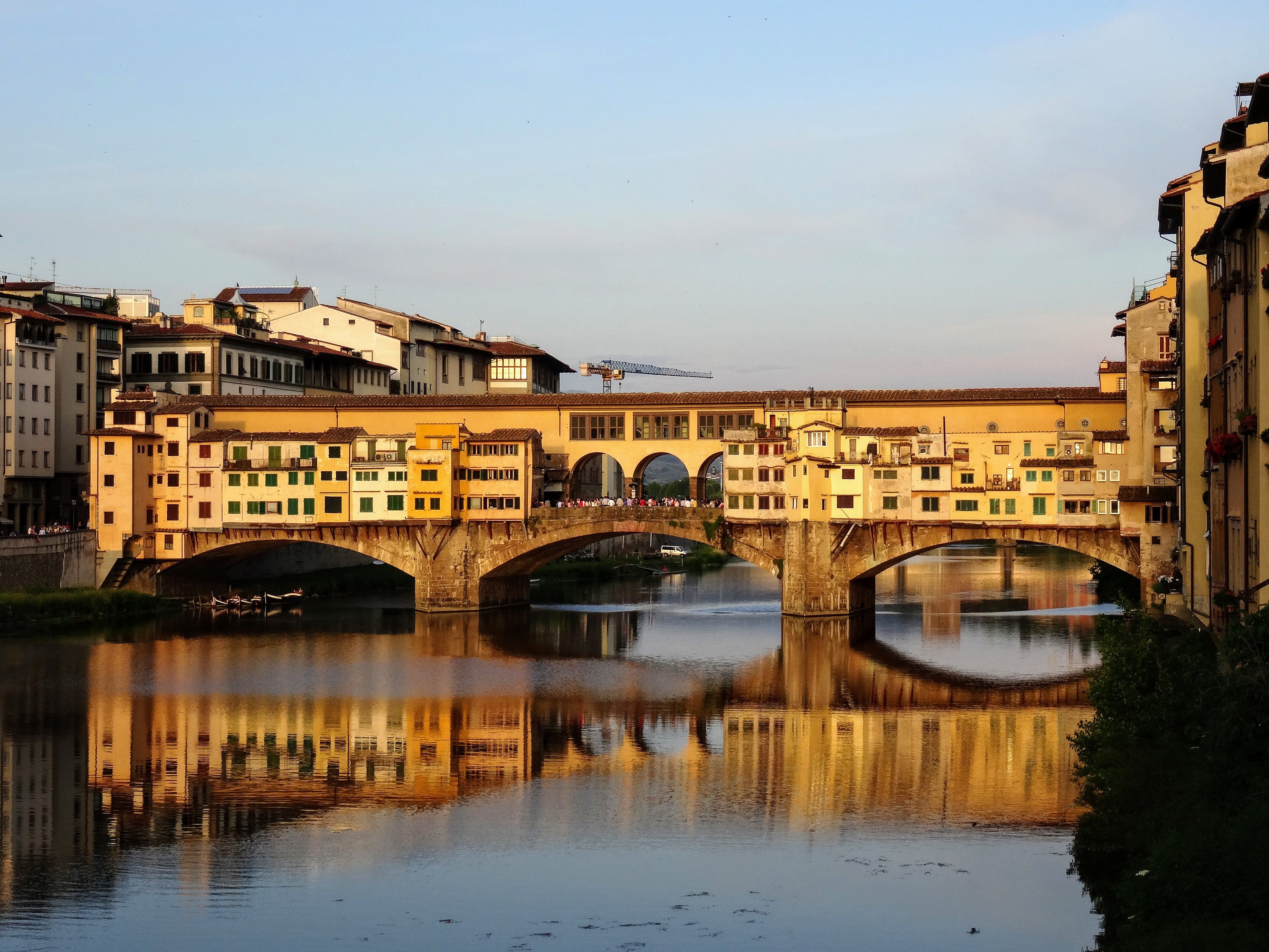 Ponte Vecchio - a medieval stone closed arch bridge over the Arno River